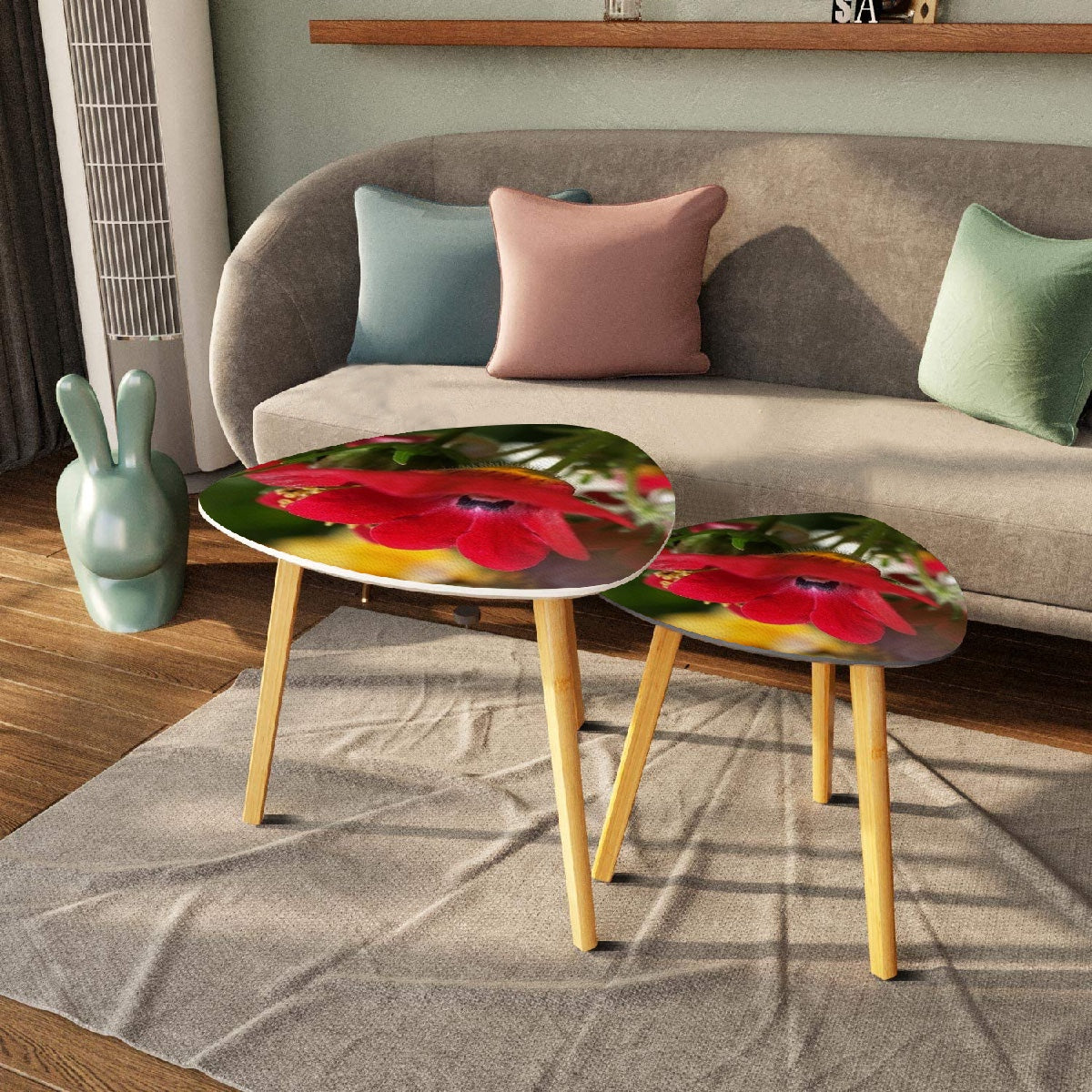 set of 2 triangular coffee tables featuring close up of red flower
