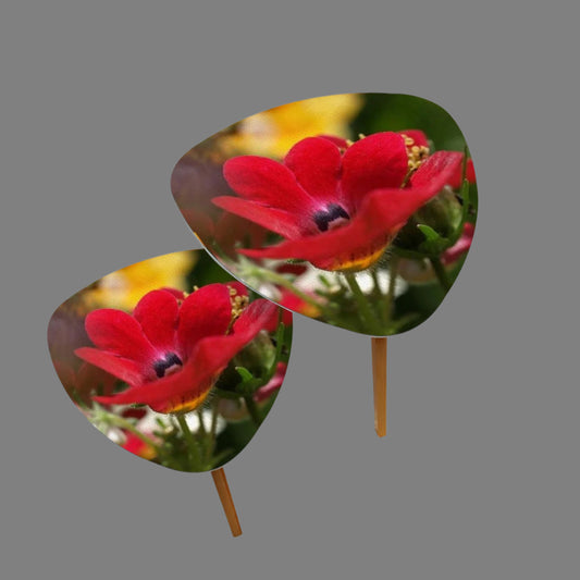 set of 2 triangular coffee tables featuring close up of red flower
