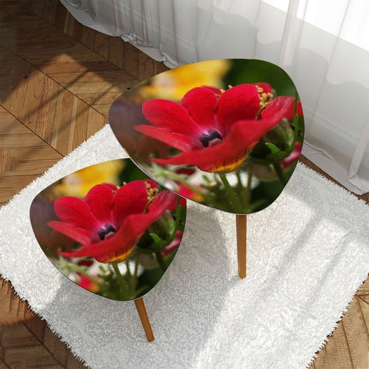 set of 2 triangular coffee tables featuring close up of red flower