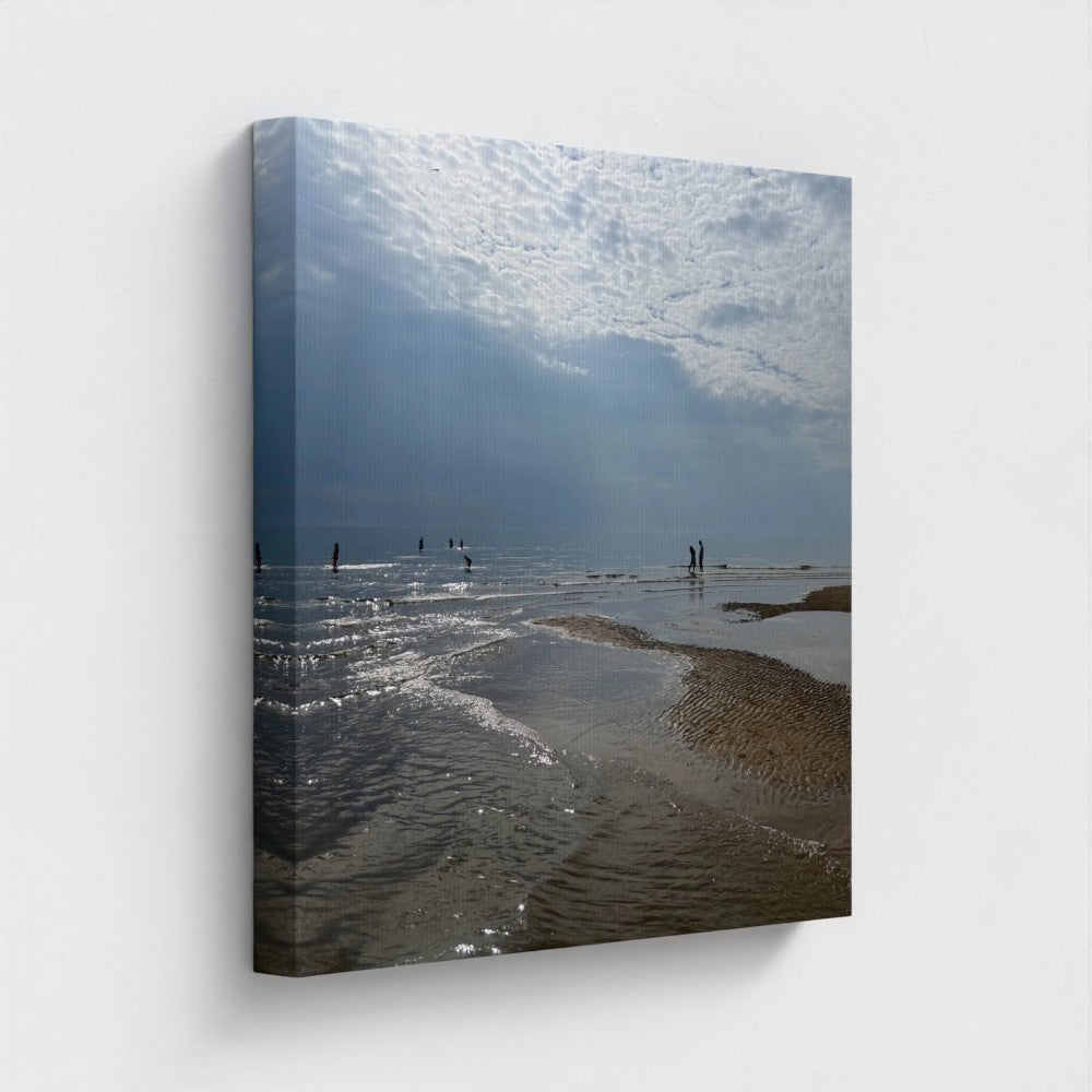 Side angle of square eco-friendly canvas showing Blackpool Beach with reflective wet sand, distant people, and a textured sky