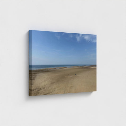 Side angle of eco-friendly Blackpool Beach canvas showing sandy shore, sea horizon, and open sky in soft natural light