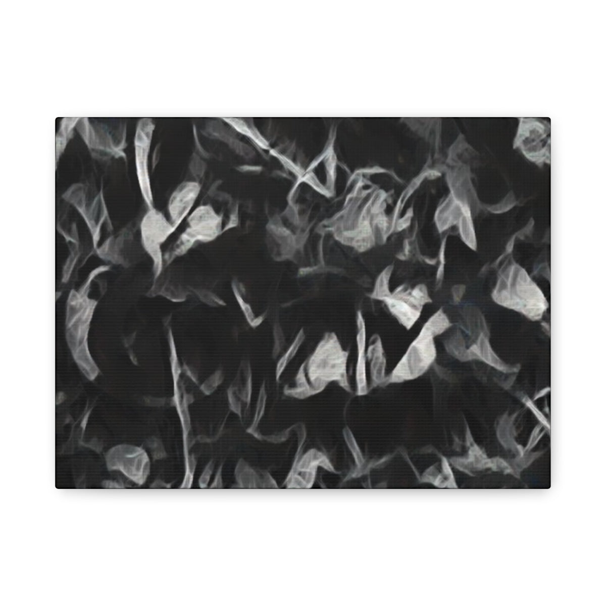 Pale, smoky leaf textures emerge from dark charcoal shapes in this soft-focus, greyscale abstraction