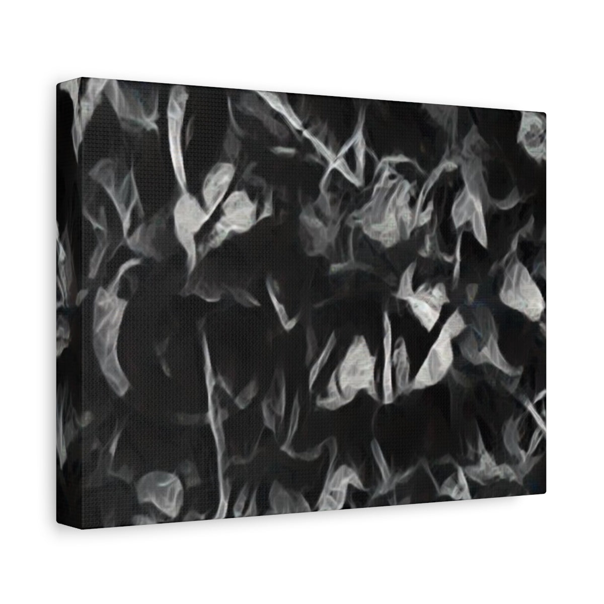 Pale, smoky leaf textures emerge from dark charcoal shapes in this soft-focus, greyscale abstraction - angled view