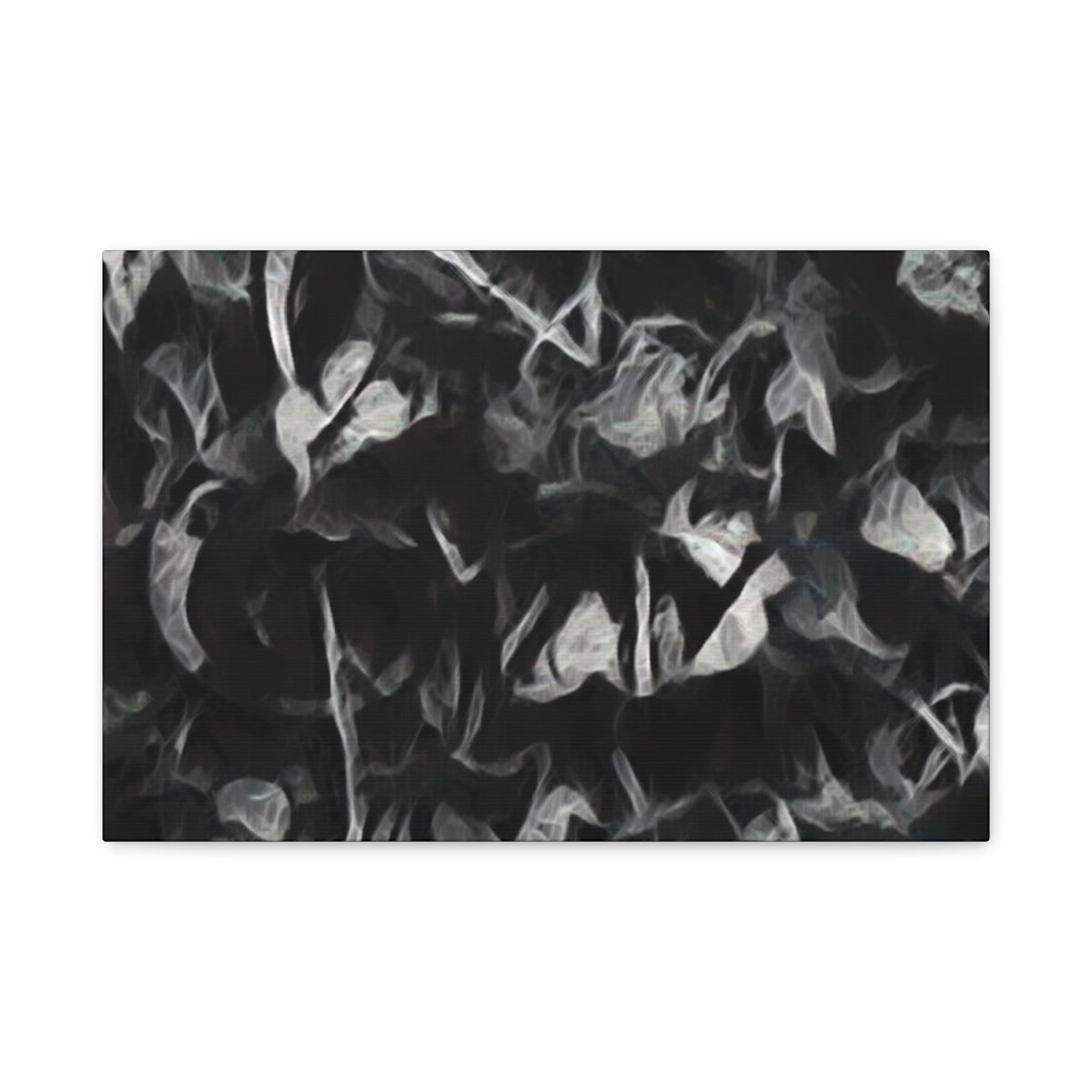 Pale, smoky leaf textures emerge from dark charcoal shapes in this soft-focus, greyscale abstraction