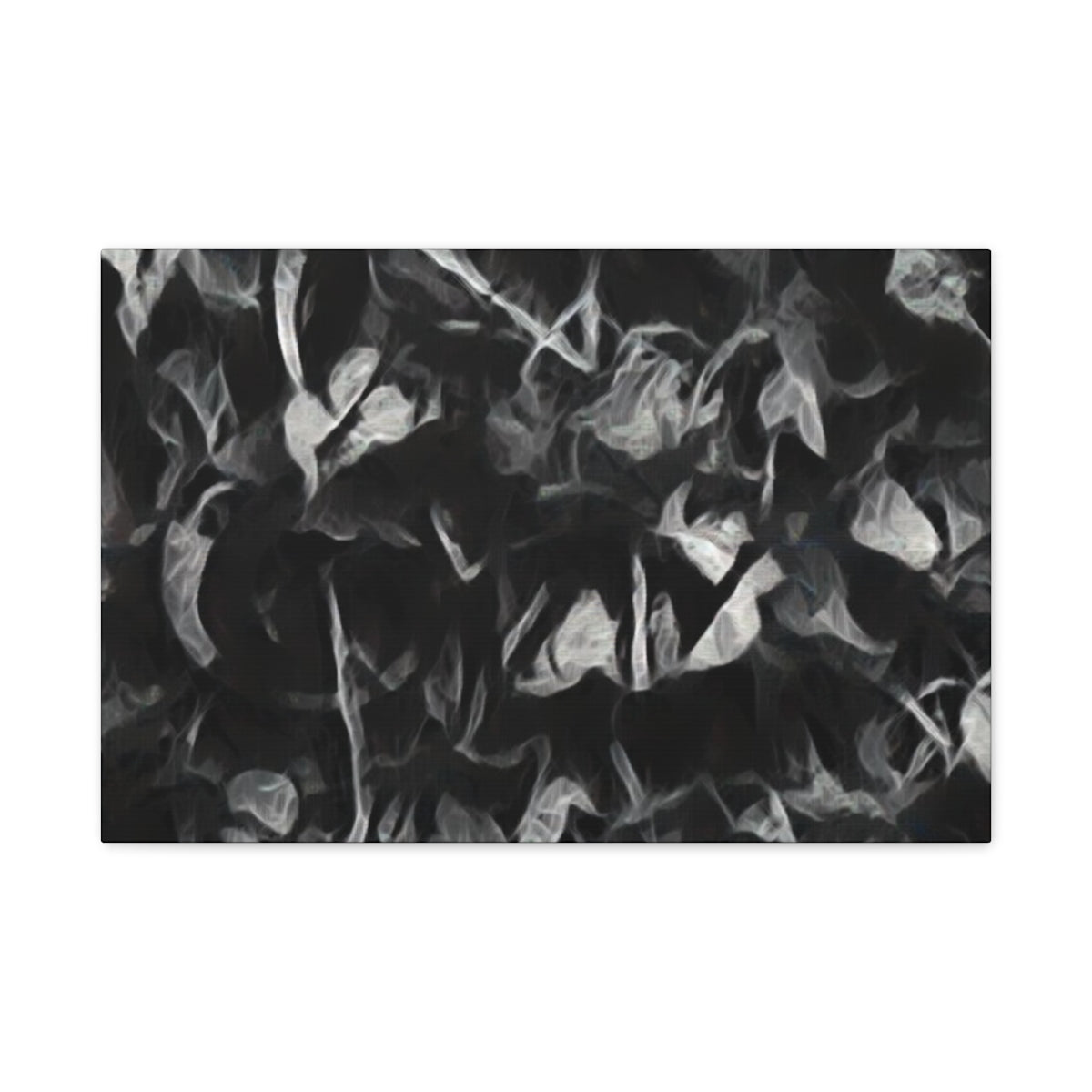 Pale, smoky leaf textures emerge from dark charcoal shapes in this soft-focus, greyscale abstraction