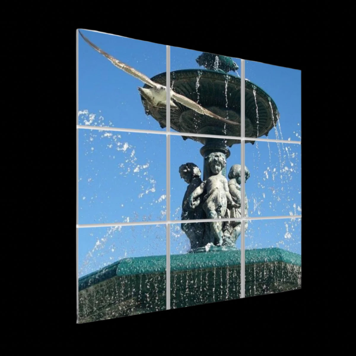 Left‑side angled view of the full‑color seagull‑over‑Lisbon 9‑panel sound‑absorbing wall art, highlighting panel depth and vivid tones