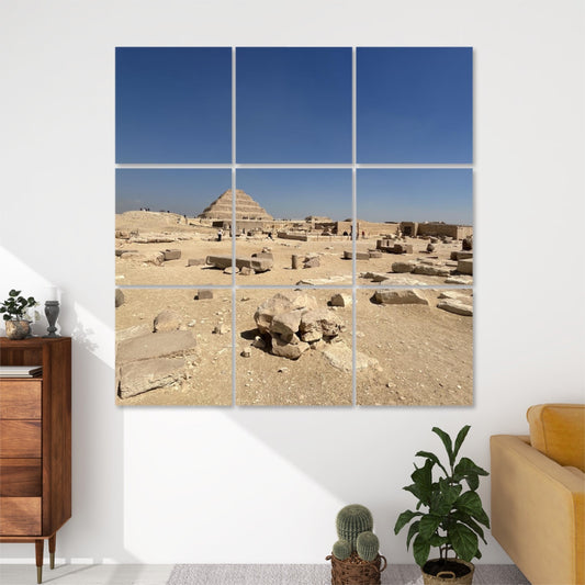 Front view of 9-panel acoustic wall art showing the Step Pyramid of Djoser at Saqqara surrounded by ancient ruins under a deep blue sky.