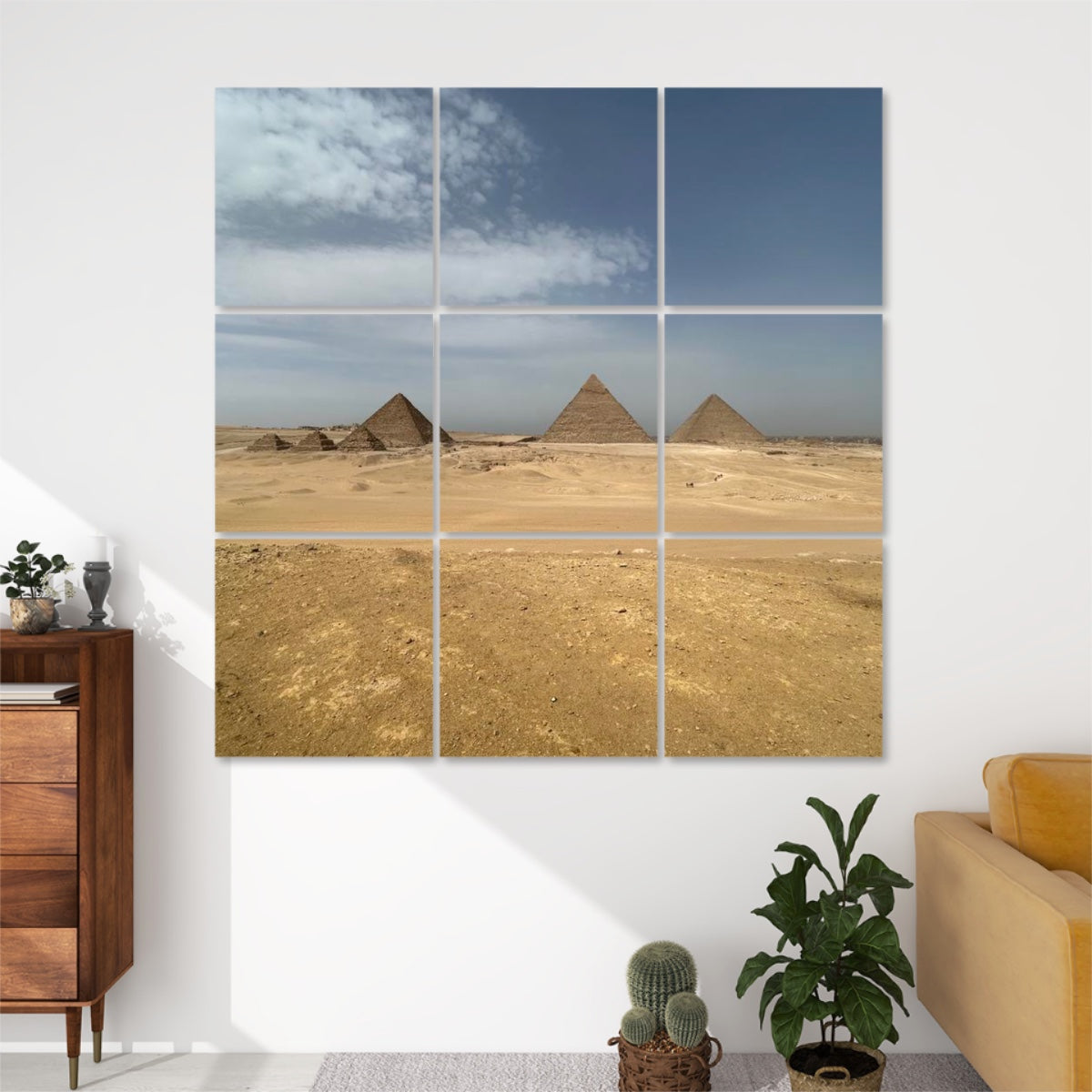 Front view of 9-panel acoustic wall art featuring a wide desert landscape with the three Pyramids of Giza under a partly cloudy sky.