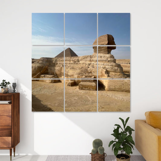 Front view of 9-panel acoustic wall art featuring the Great Sphinx of Giza in profile with the Pyramid of Khufu in the background under a blue sky.