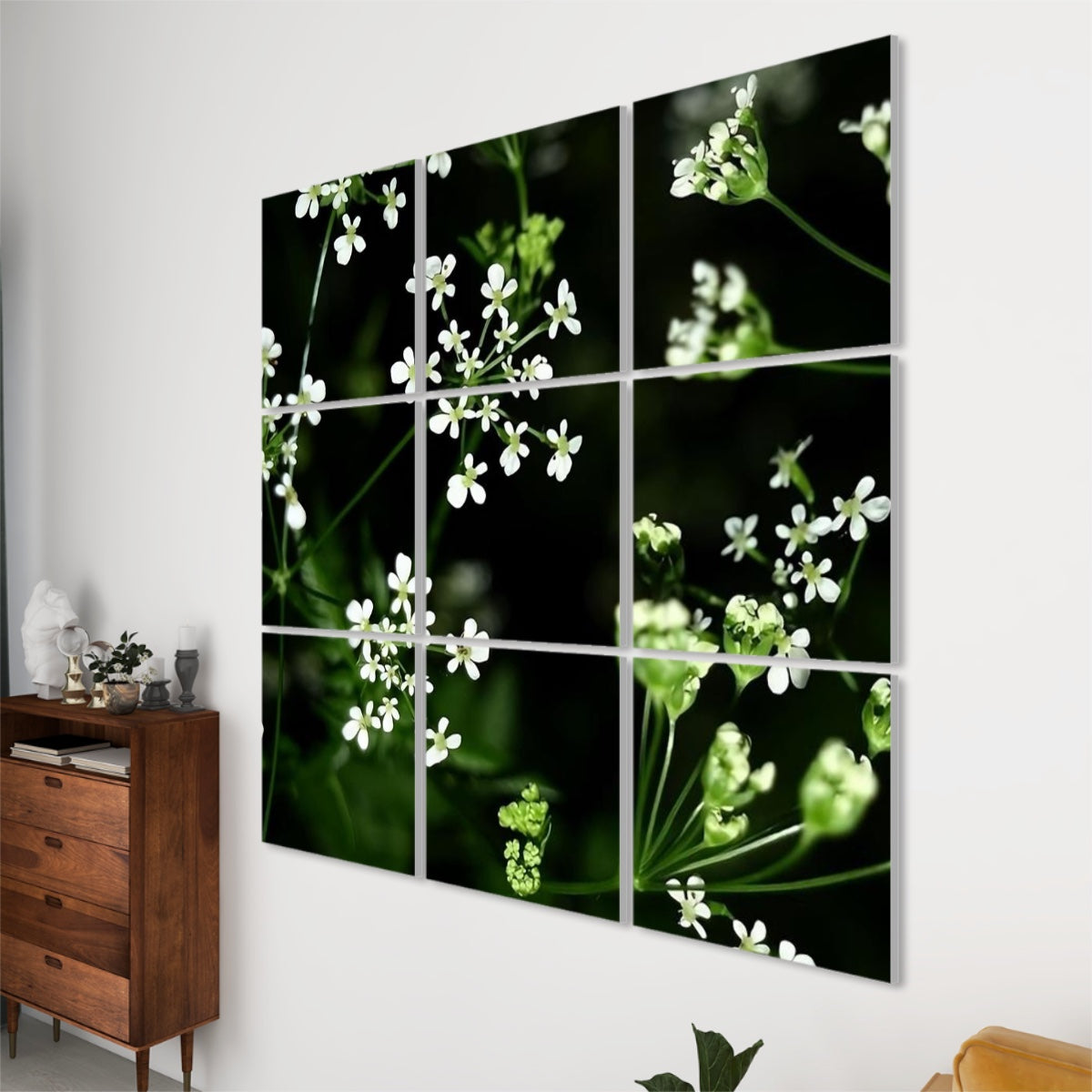 Right-angle view of 9-panel White Wildflowers wall art featuring blooming white flowers with dark green tones and visible panel texture.