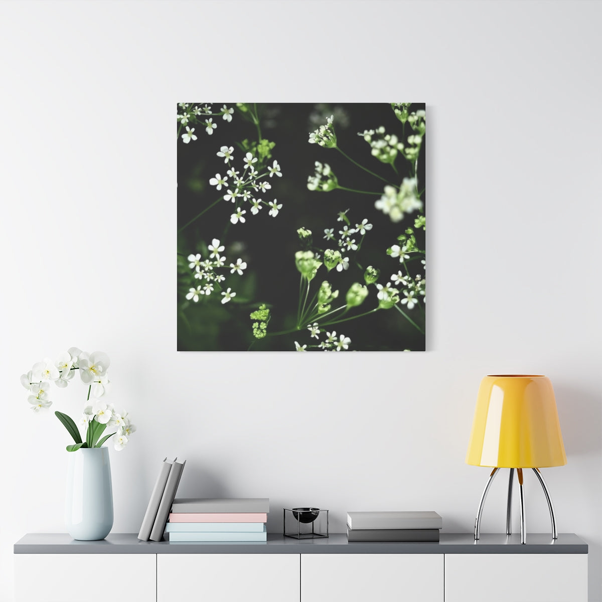 floral canvas print featuring white little flowers on black and green background