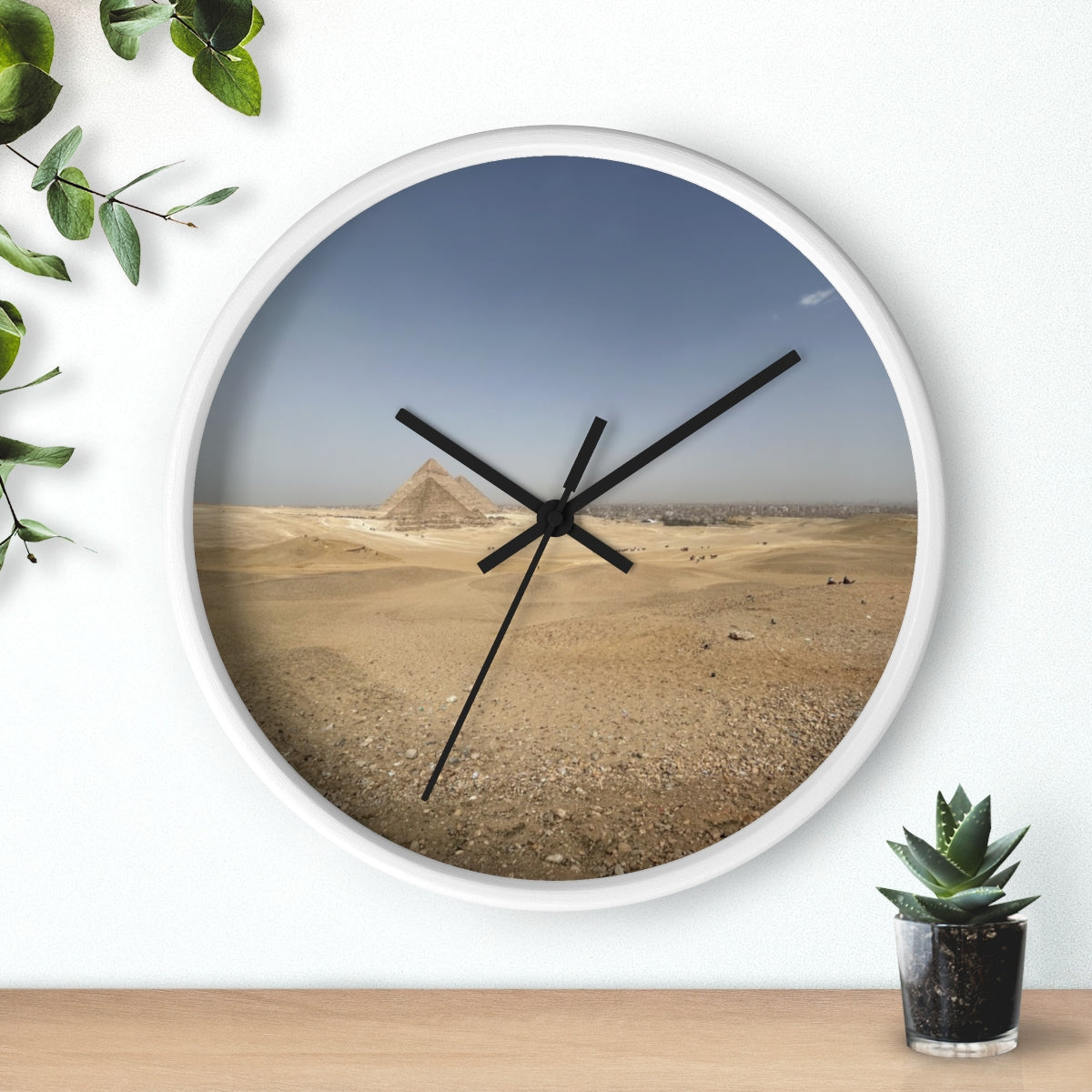 Wall clock featuring image of Pyramids of Giza, base: white, handles: black, size: 10’’