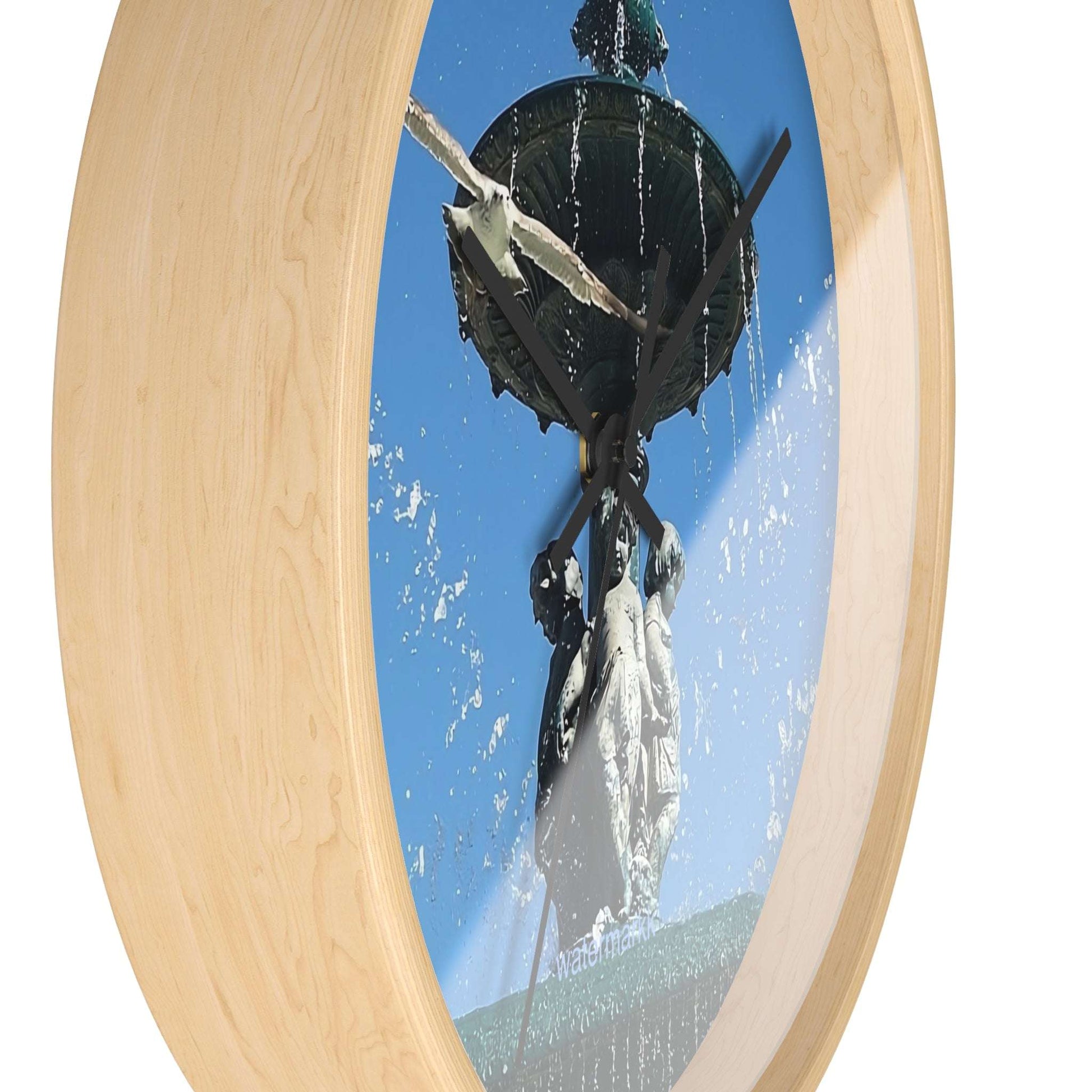 Wall ClWall Clock featuring seagull in flight with fountain in Lisbon in background, base: wooden, handles: black, size: 10''