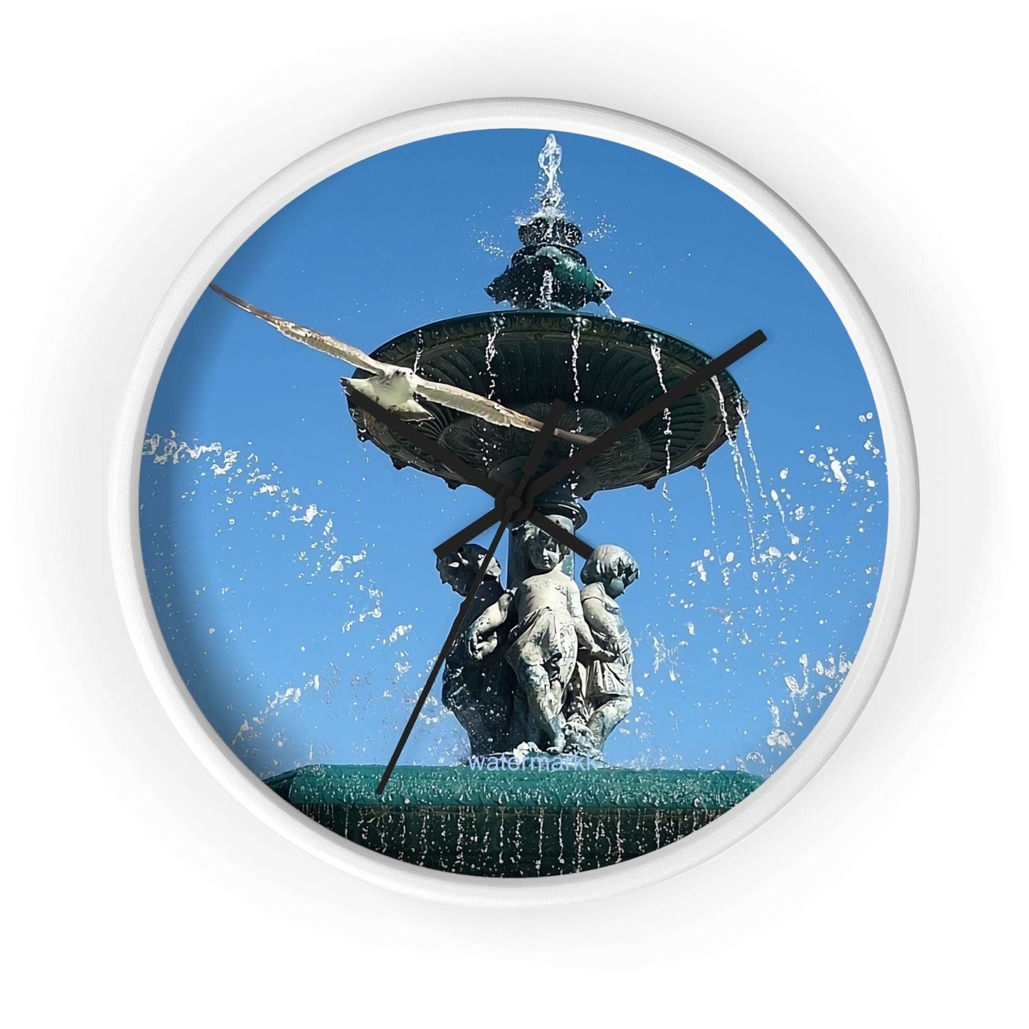 Wall Clock featuring seagull in flight with fountain in Lisbon in background, base: white, handles: black, size: 10''