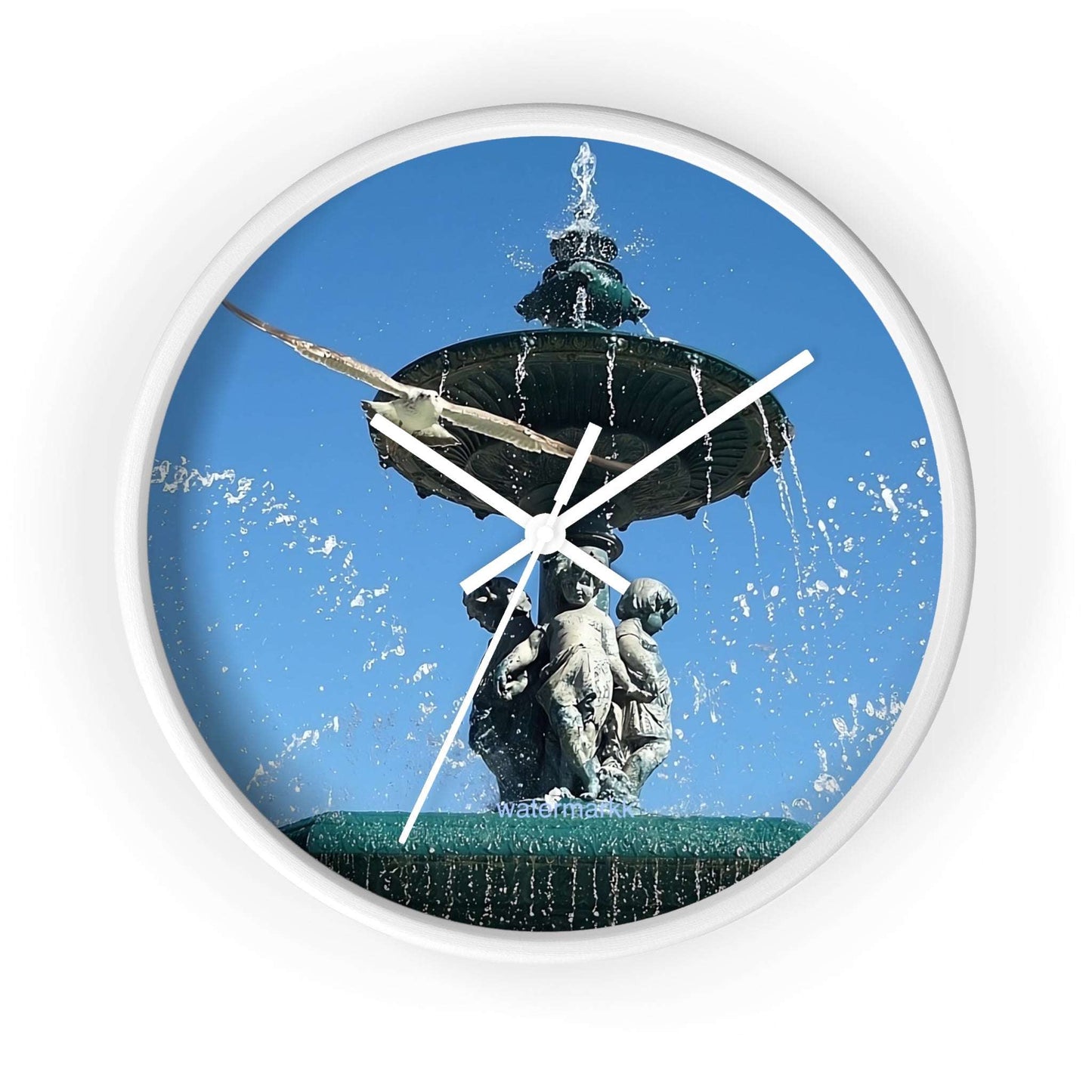 Wall ClWall Clock featuring seagull in flight with fountain in Lisbon in background, base: white, handles: white, size: 10''