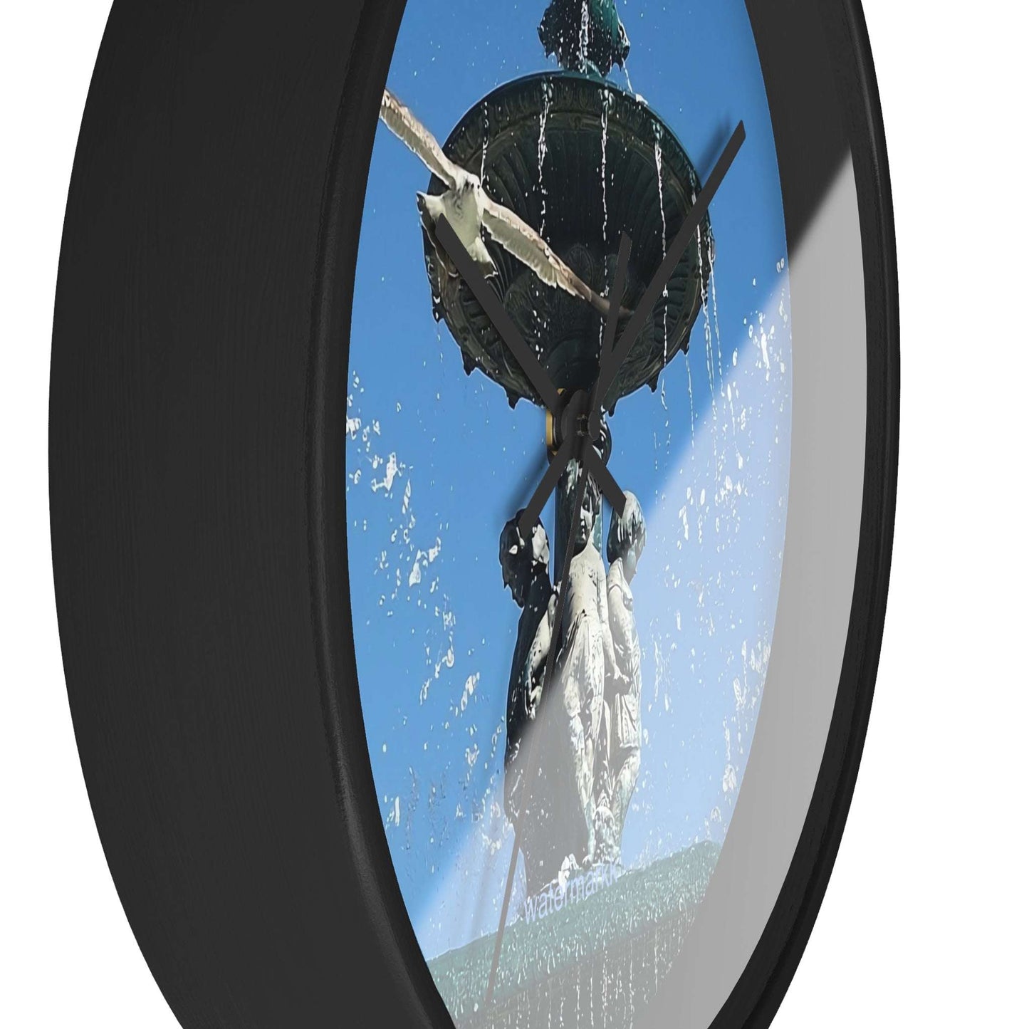 Wall ClWall Clock featuring seagull in flight with fountain in Lisbon in background, base: black, handles: black, size: 10''