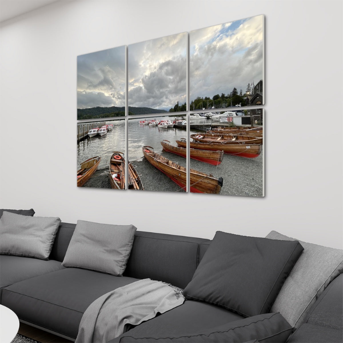 Lake District Windermere Lake 6 Decorative Sound Absorbing Wall Panels featuring wooden boats on lake above gray couch