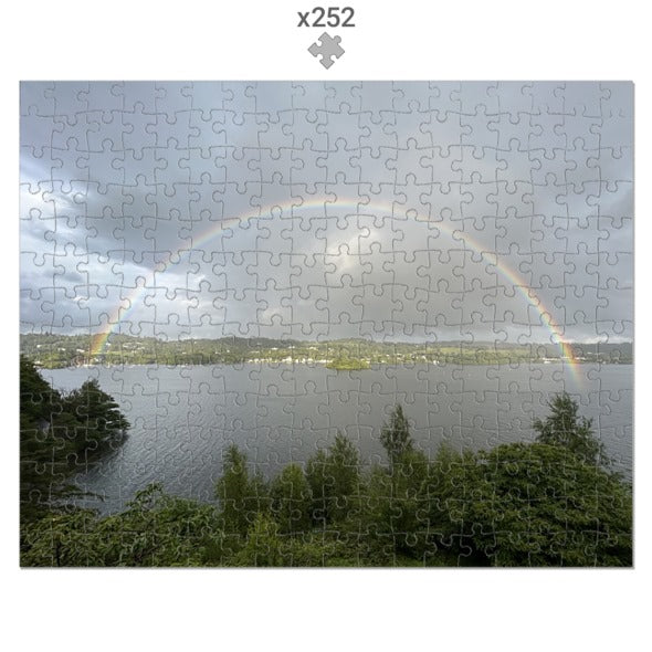 252-piece Landscape with Lake and Rainbow Jigsaw Puzzle featuring a scenic lake and vibrant rainbow over green trees