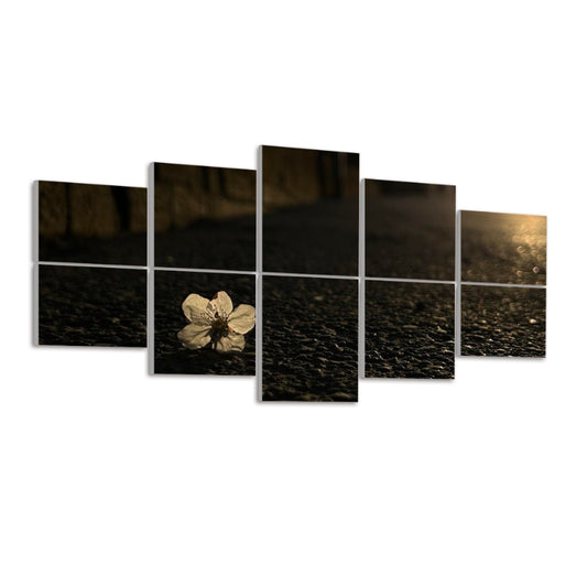 Left-angled view of 10 acoustic wall panels featuring a pale blossom on textured asphalt in full color and warm lighting.