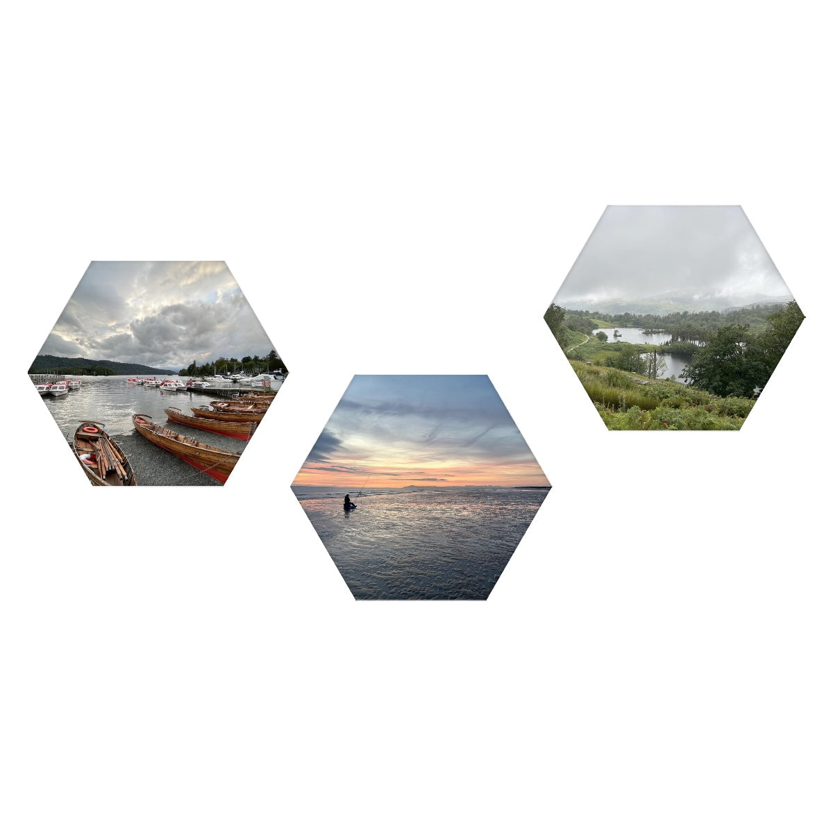 3 Hexagonal Decorative Sound Absorbing Wall Panels Set with three landscape prints of boats on lake sunset sea
