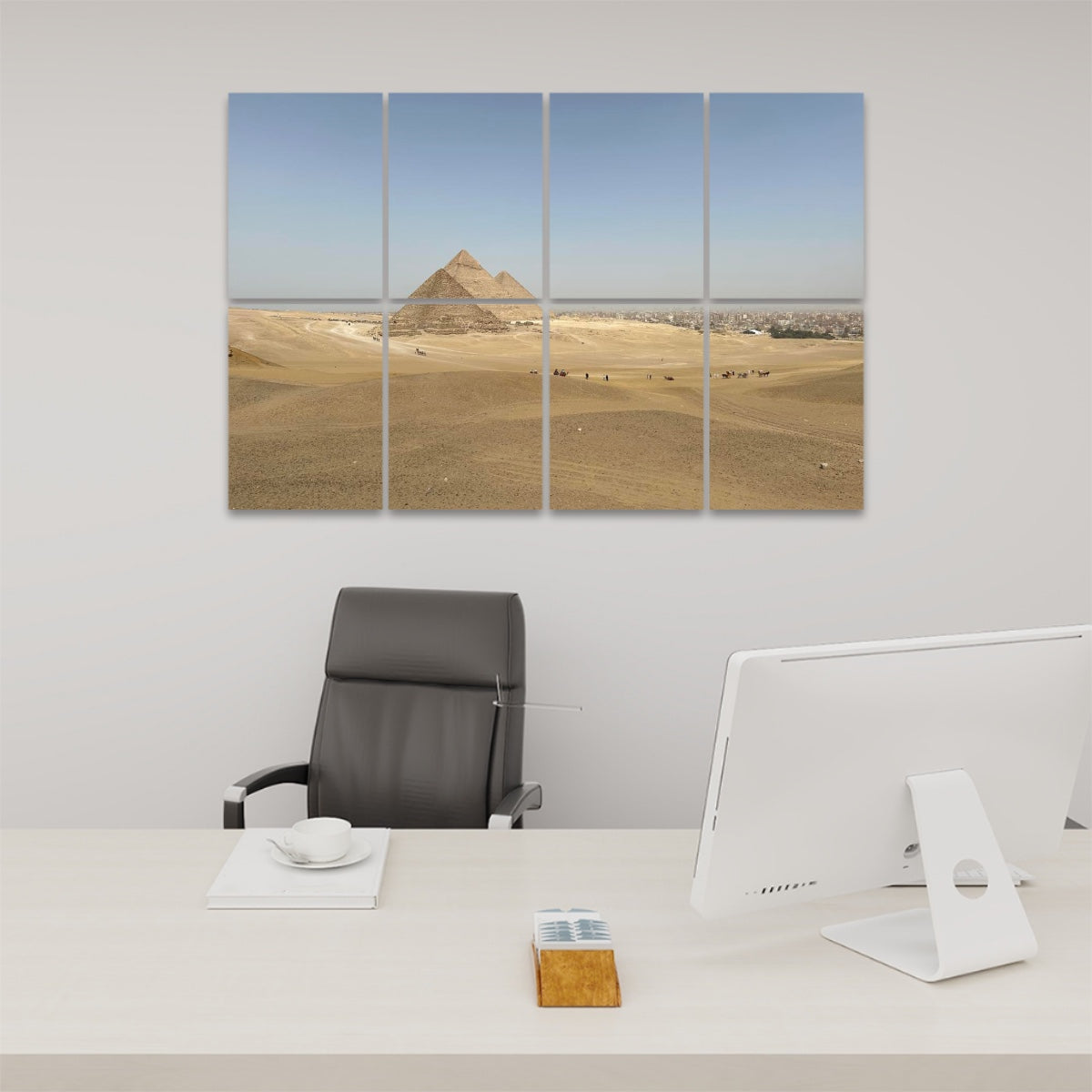 Front view of 8-panel acoustic wall art featuring the distant pyramids of Giza under a clear sky with scattered people and carriages across a sunlit desert.
