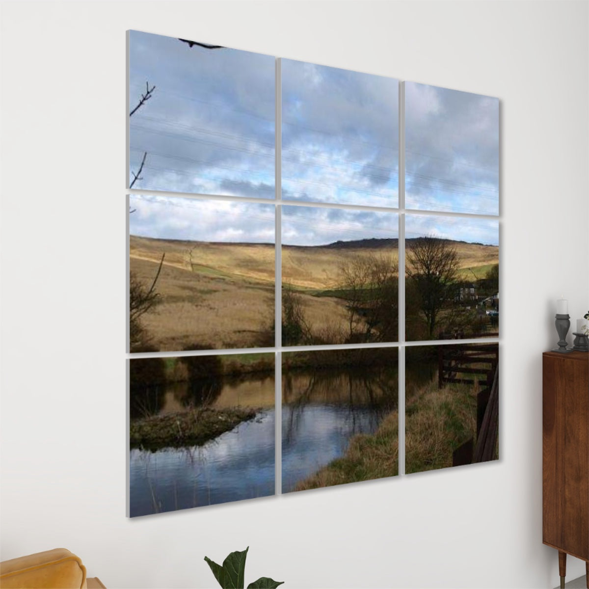 Left-angle view of British Countryside acoustic wall panels showing pond reflections, hillside light, and depth of the panel grid.