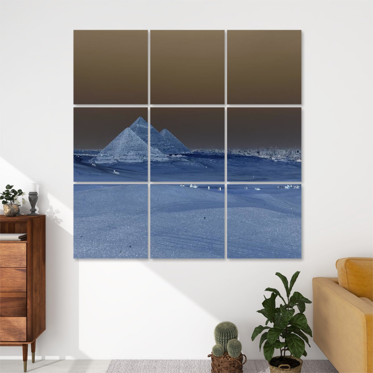 Inverted color version of the Distant Pyramids wall art, showing surreal negative hues across the desert and pyramid scene on 9 acoustic panels.
