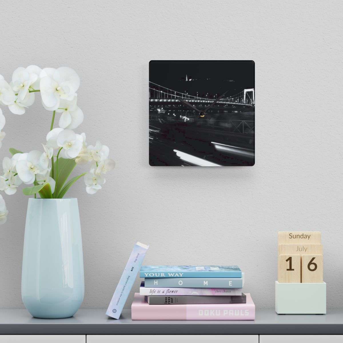 Acrylic Wall Clock featuring black and white long exposure photograph of bridge in Budapest by night with citadel in the background and car in the foreground