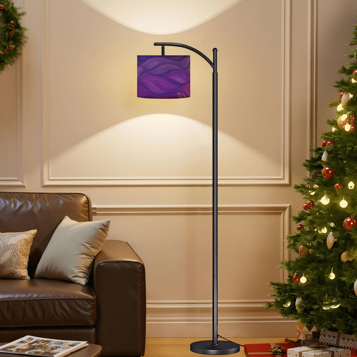 Arc floor lamp with black metal base and gilded arm; linen shade in swirling purple, magenta, and gold wave pattern.