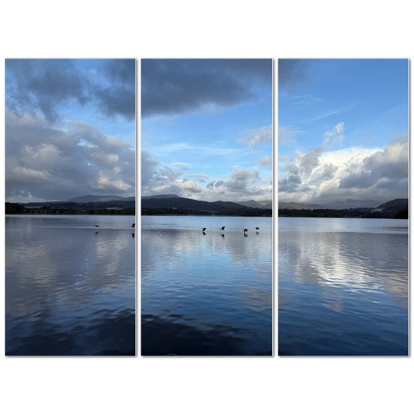 Birds Flying Over Windermere Lake - Lake District Landscape with Serene Water and Dramatic Clouds
