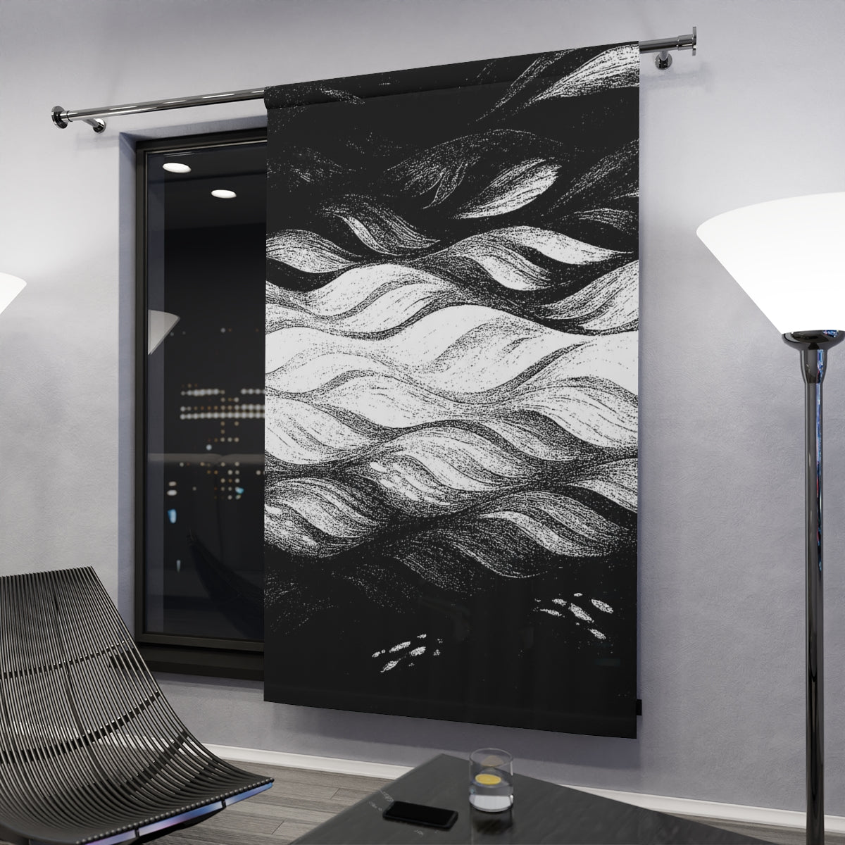 Monochrome blackout curtain with stylized wave lines in white and textured black, installed in a modern nighttime interior—50″ × 84″.