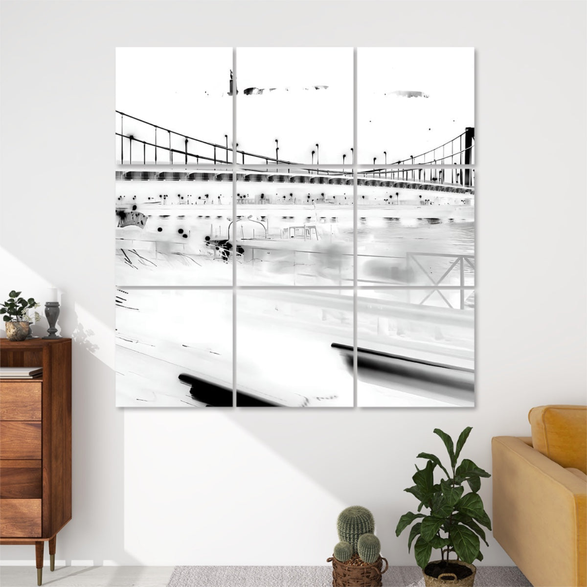 Black and white photo of Elisabeth Bridge in Budapest captured at night with light trails and water reflections.