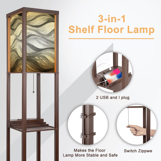 Walnut-finish wood floor lamp with three square shelves displaying a vase and books, topped by a linen cube shade in bold black-and-white wavy abstract design. A metal pull-chain switch and black power cord are visible beneath the shade.