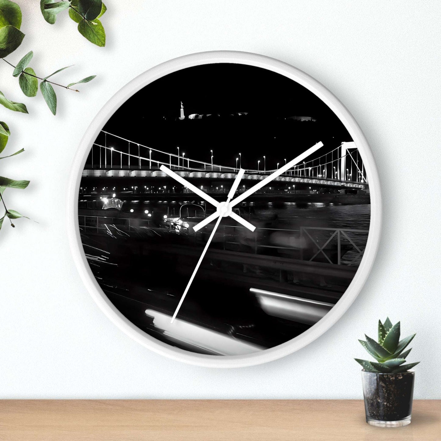black and white wall clock featuring Budapest by night, bridge over Danube river, and Citadel, base: white: white, handles: white, size: 10''