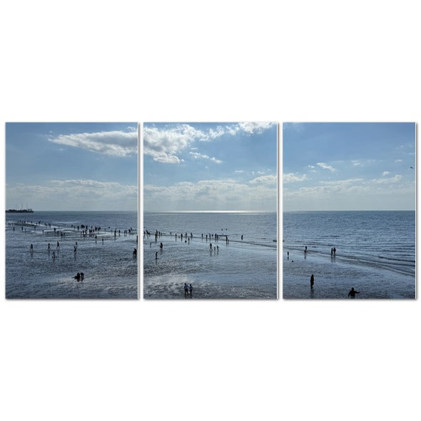 Made in UK Triptych Canvas featuring Beach in Shadow with Sunlight on the Horizon. three panel seascape with people on wet sand