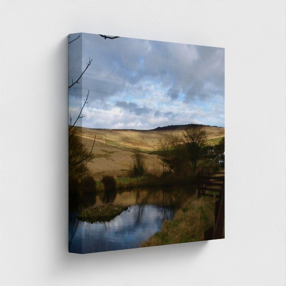 Papi's Canvas Eco-Friendly Wall Art featuring a serene landscape with reflections on a calm pond and rolling hills andcloudy sky