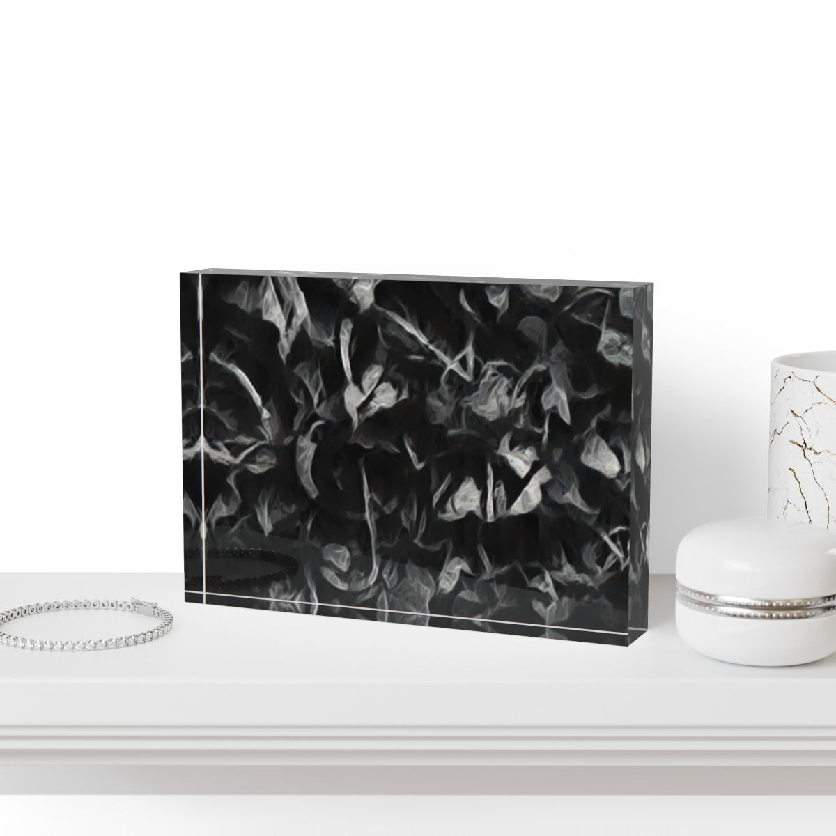 Mockup of block set on a concrete shelf with sculptural ceramics