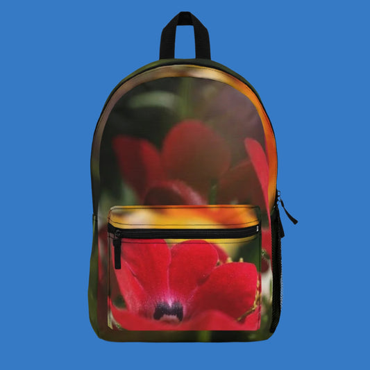 colourful floral backpack featuring red flower