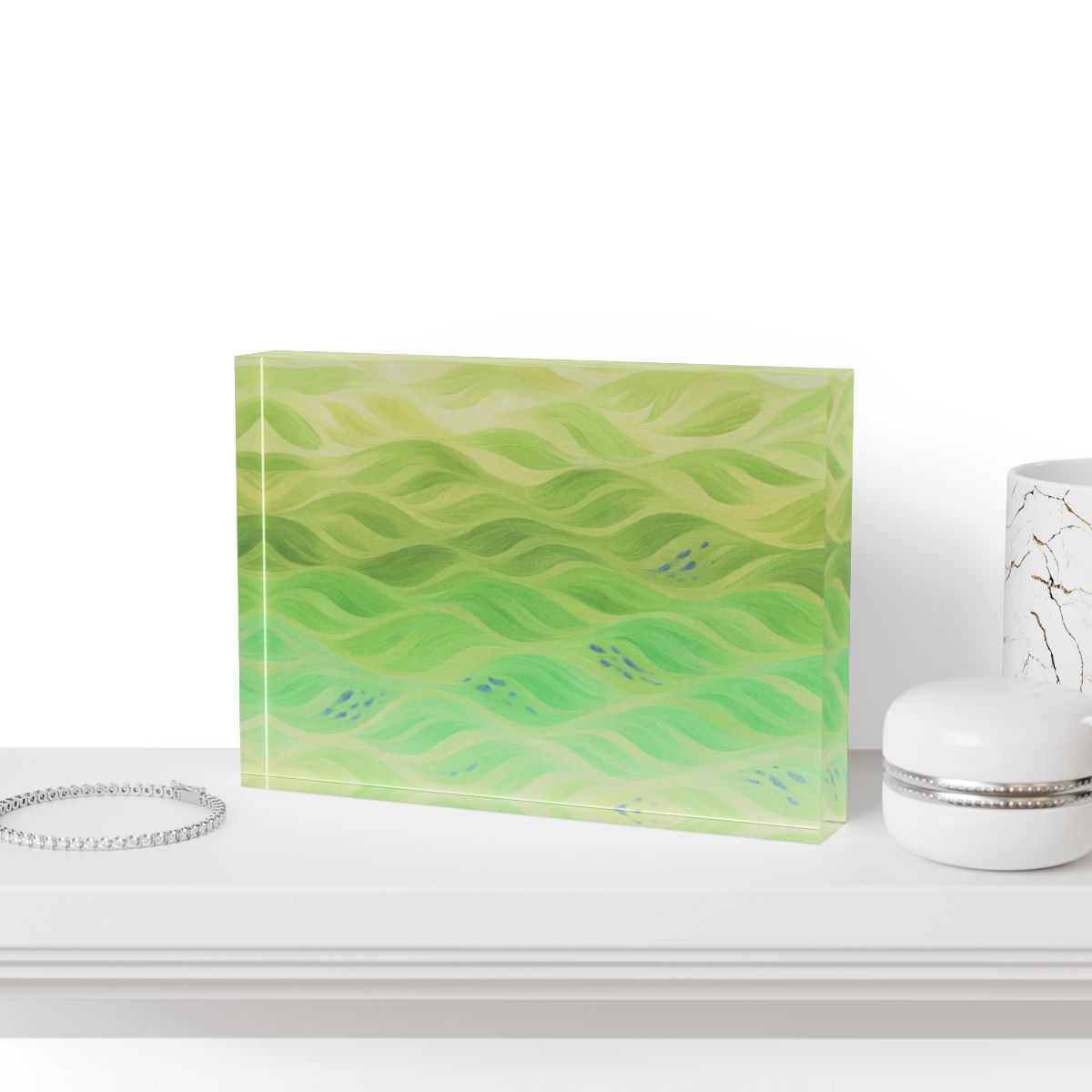 Positioned on a shelf beside succulents, showcasing how the vibrant greens brighten any decor