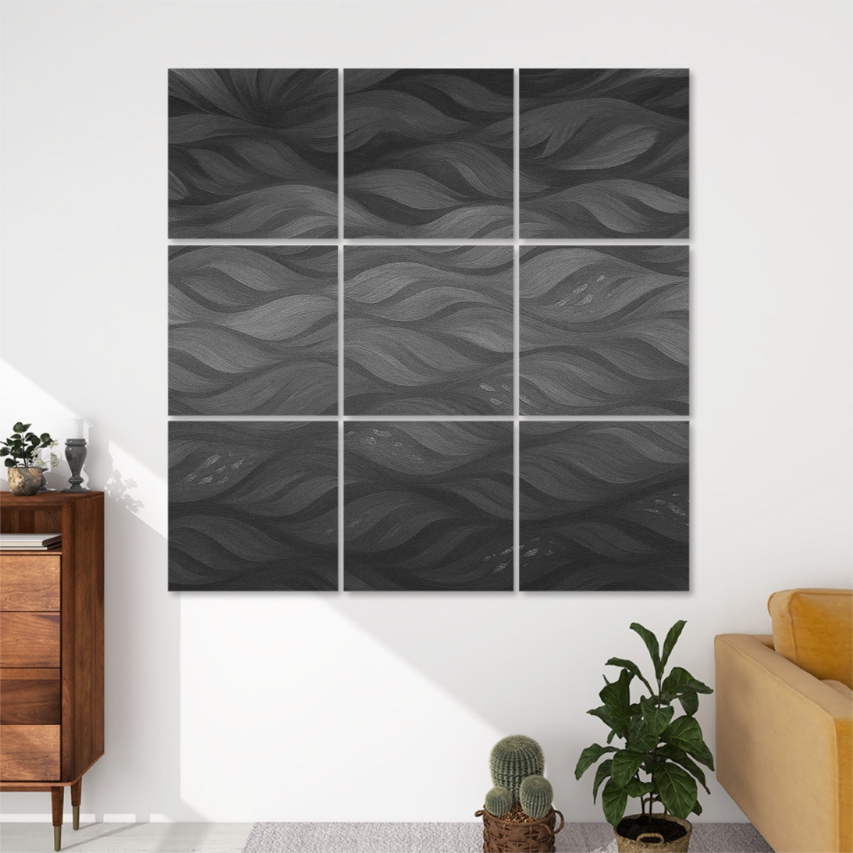 Nine panels in subtle gray graduations, arranged in a square grid on a white wall above a simple wood shelf