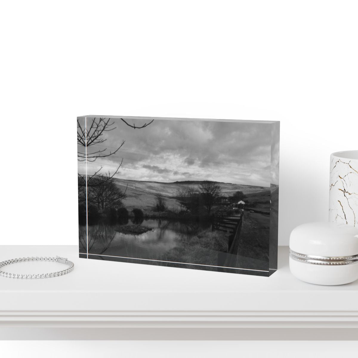 Grayscale version of a British countryside acrylic photo block, showing hills, trees, and sky in soft monochrome tones for a minimalist look.