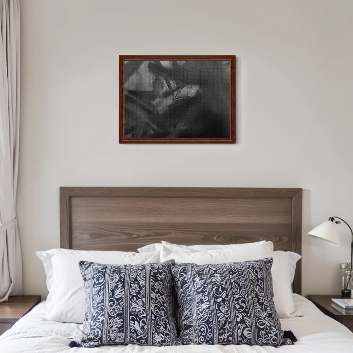 Greyscale version of red and green foliage jigsaw puzzle with soft-focus and blurred background