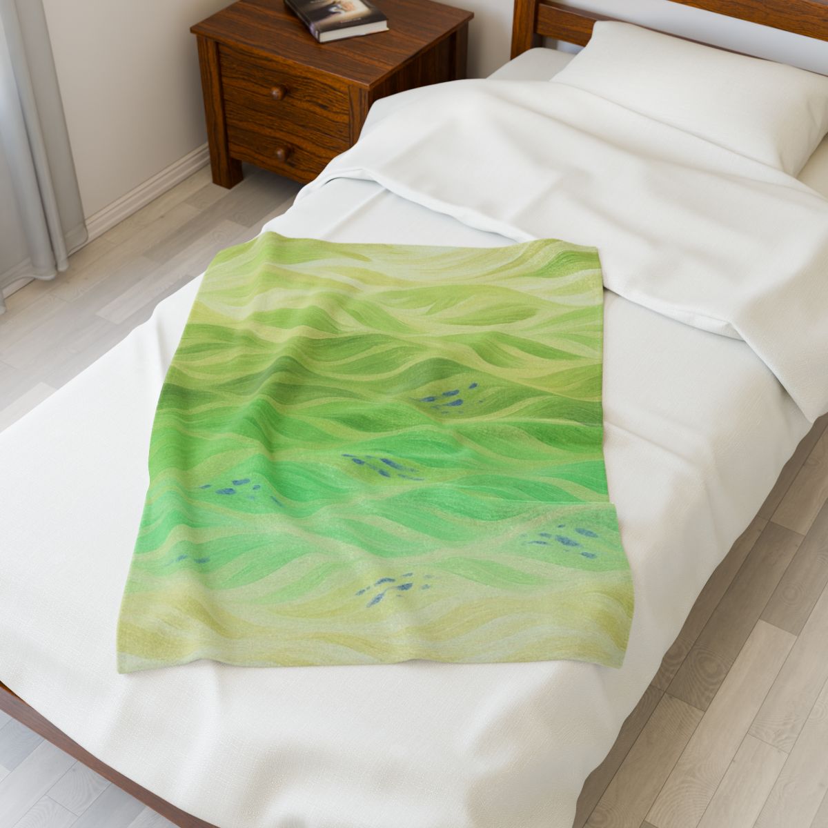 Lemon and lime version of Gilded Amethyst blanket with bright green and yellow tones, placed on a small bed