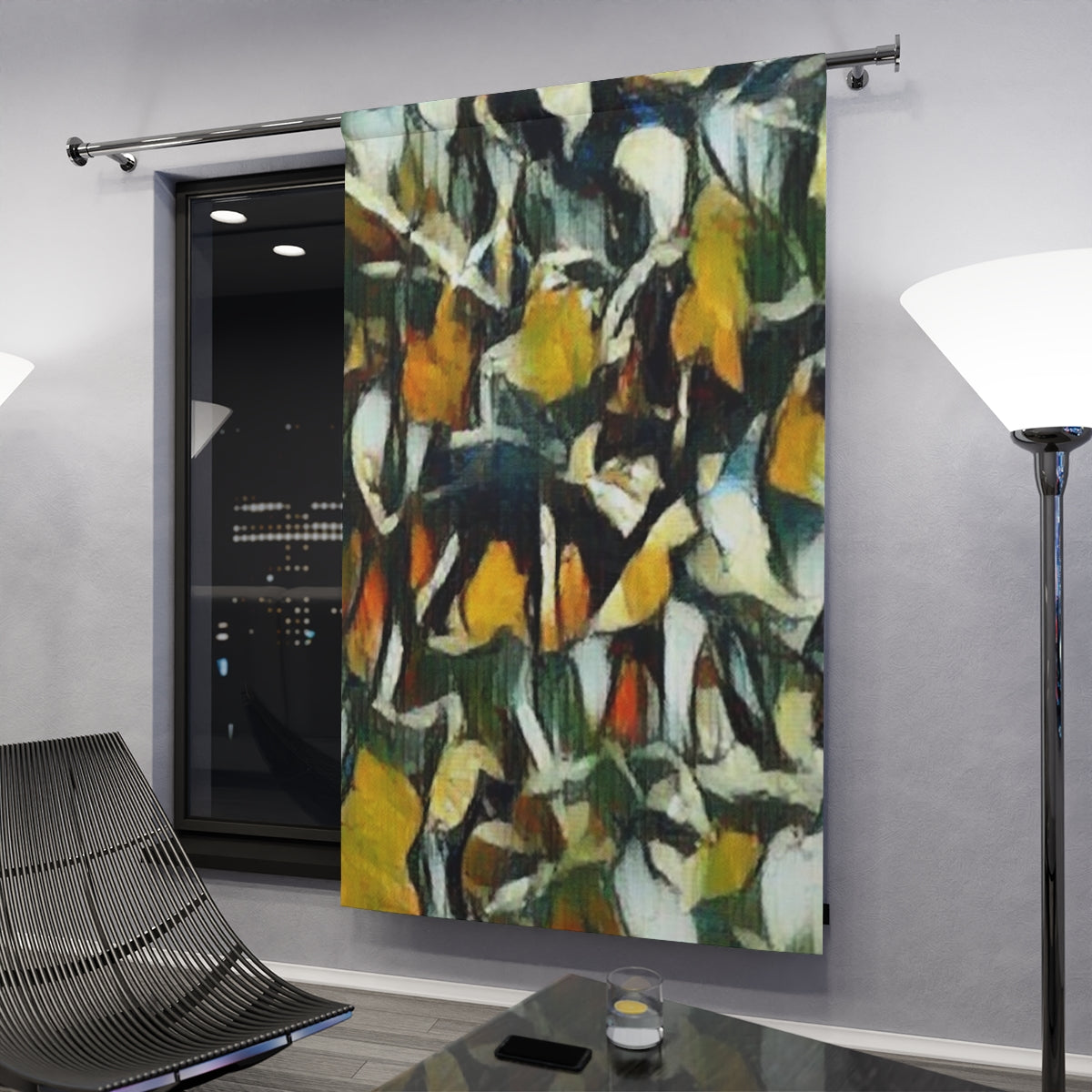 Color-rich blackout curtain with jagged black and gold foliage forms glowing subtly under interior light in a modern nighttime setting