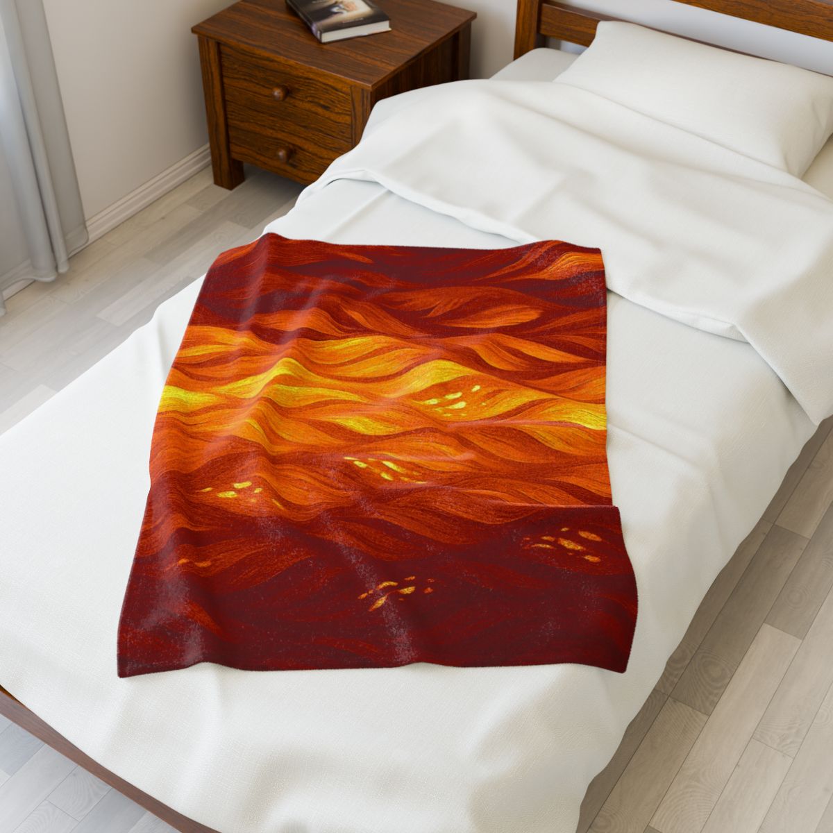 Gilded Amethyst throw blanket in orange and amber hues, with fiery textures arranged on a child’s bed