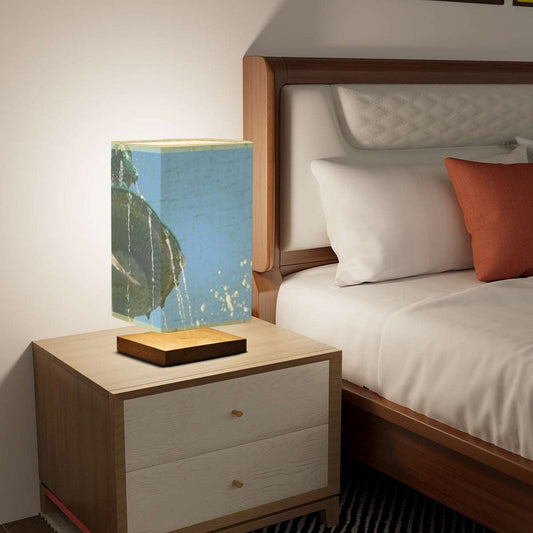 Square Table Lamp featuring picture of seagull in flight with fountain in Lisbon in the background blue sky size: 5.5''x5.5''x11'