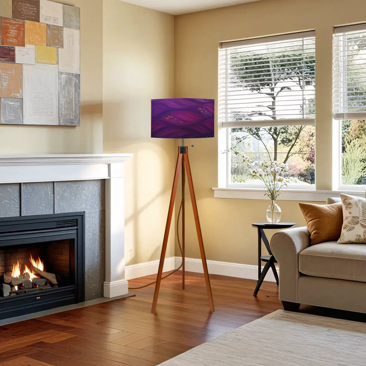 Tripod floor lamp with a linen shade patterned in swirling purple and pink amethyst currents, accented by gold flecks, atop a warm wood base.