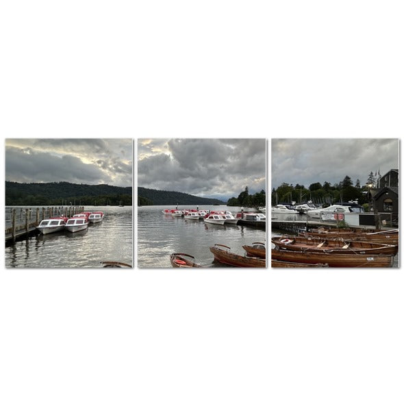 Windermere Lake District Landscape made in UK Triptych Canvas showing lakeside rowboats docks and moored boats under cloudy sky
