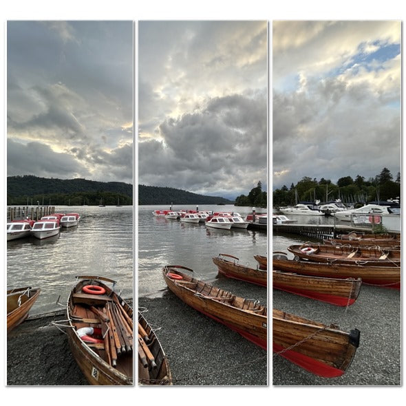 Windermere Lake District Landscape made in UK Triptych Canvas showing wooden rowing boats on lake shore under cloudy sky
