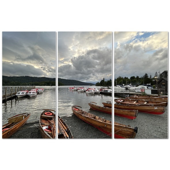 Windermere Lake District Landscape made in UK Triptych Canvas showing wooden rowboats on shore and moored boats on a cloudy lake
